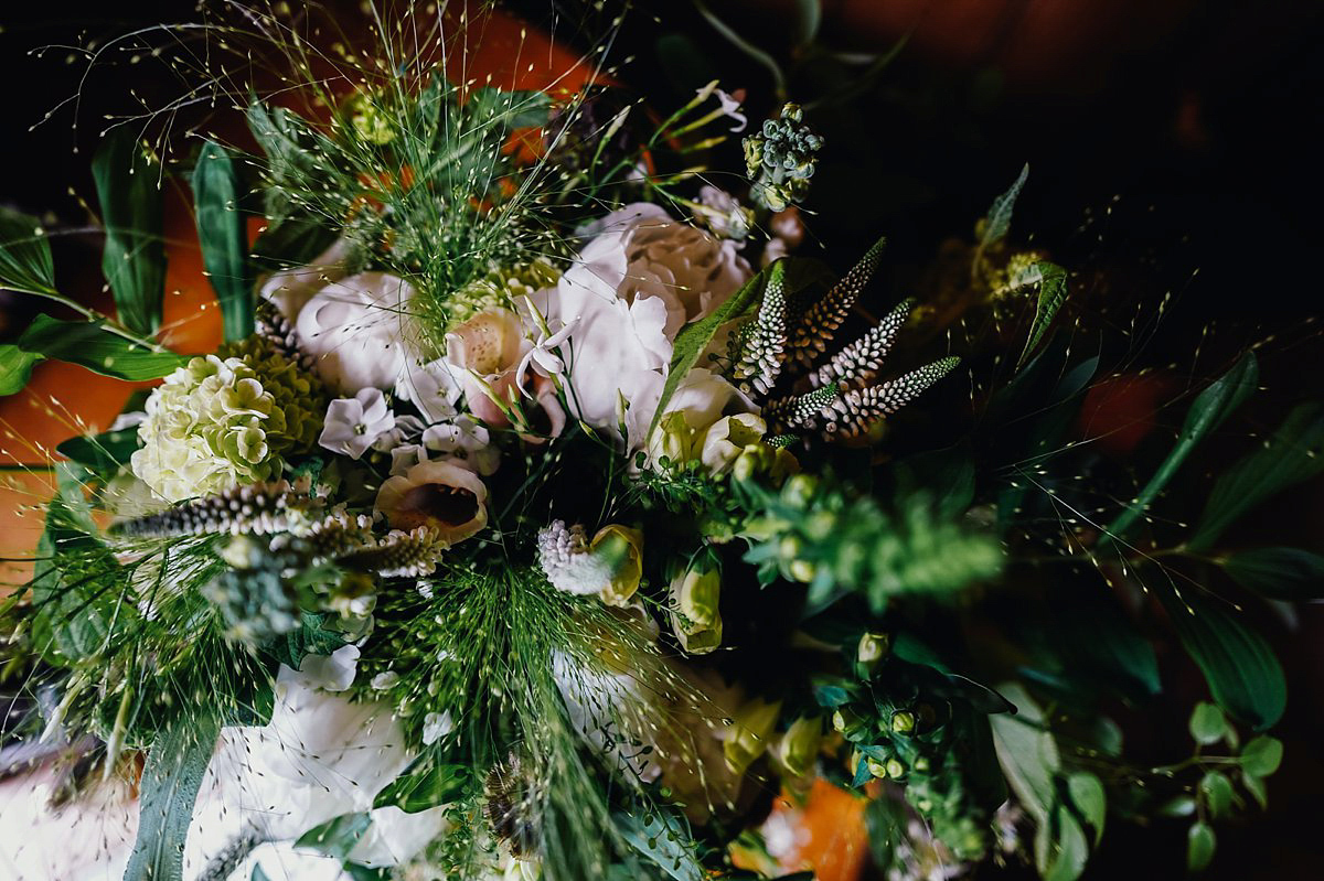 Beautiful bride Clare wore the Mariposa gown by Claire Pettibone for her laid back, fun and elegant Lake District Wedding. Photography by Lisa Aldersley.