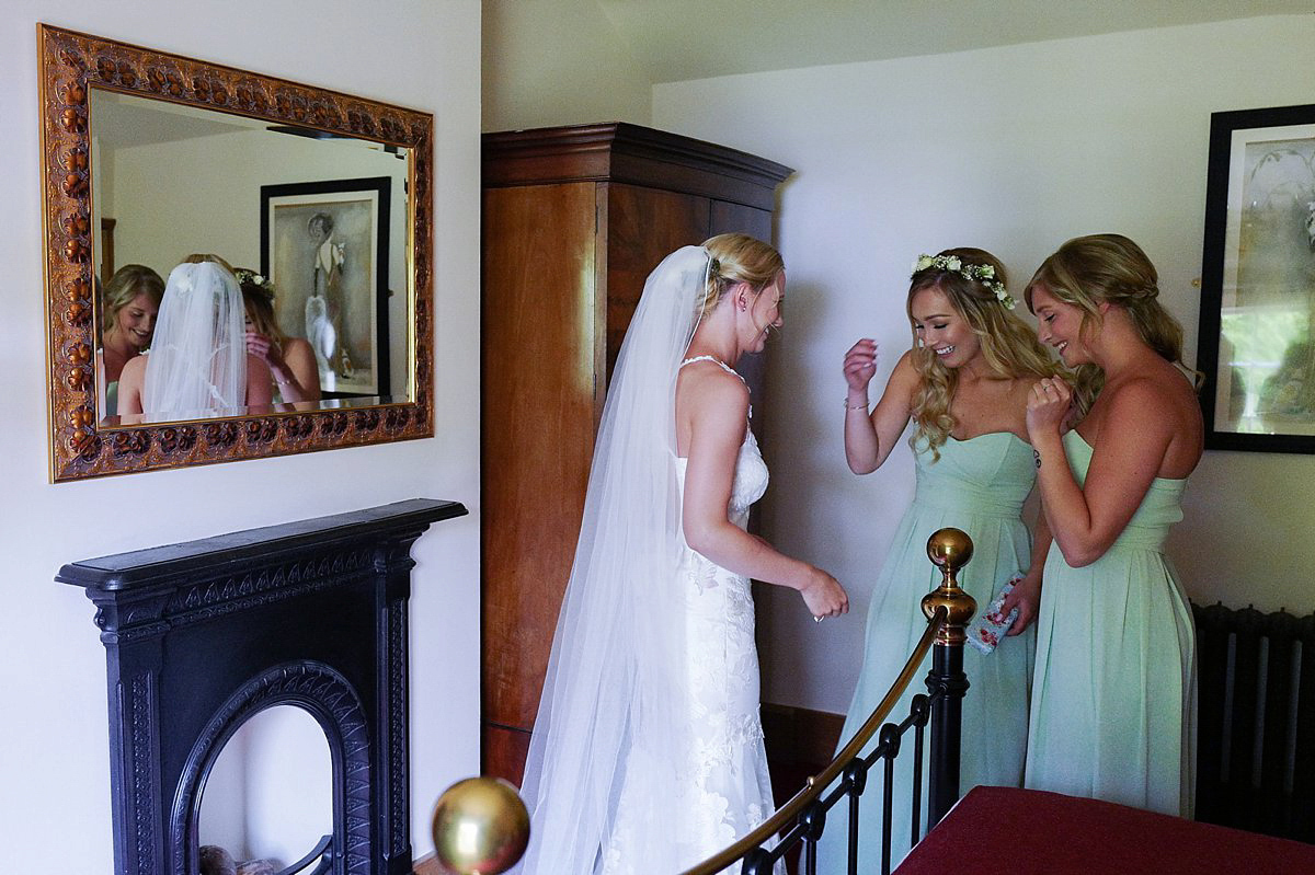 Beautiful bride Clare wore the Mariposa gown by Claire Pettibone for her laid back, fun and elegant Lake District Wedding. Photography by Lisa Aldersley.