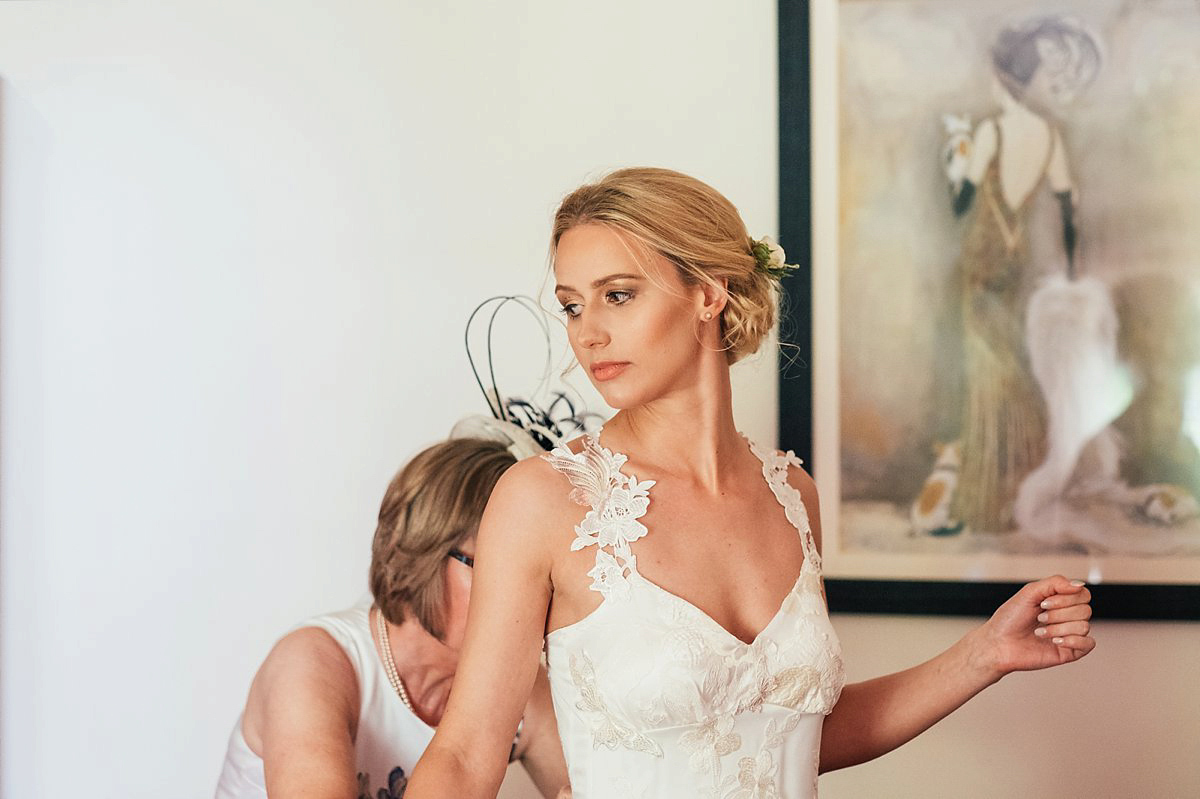 Beautiful bride Clare wore the Mariposa gown by Claire Pettibone for her laid back, fun and elegant Lake District Wedding. Photography by Lisa Aldersley.