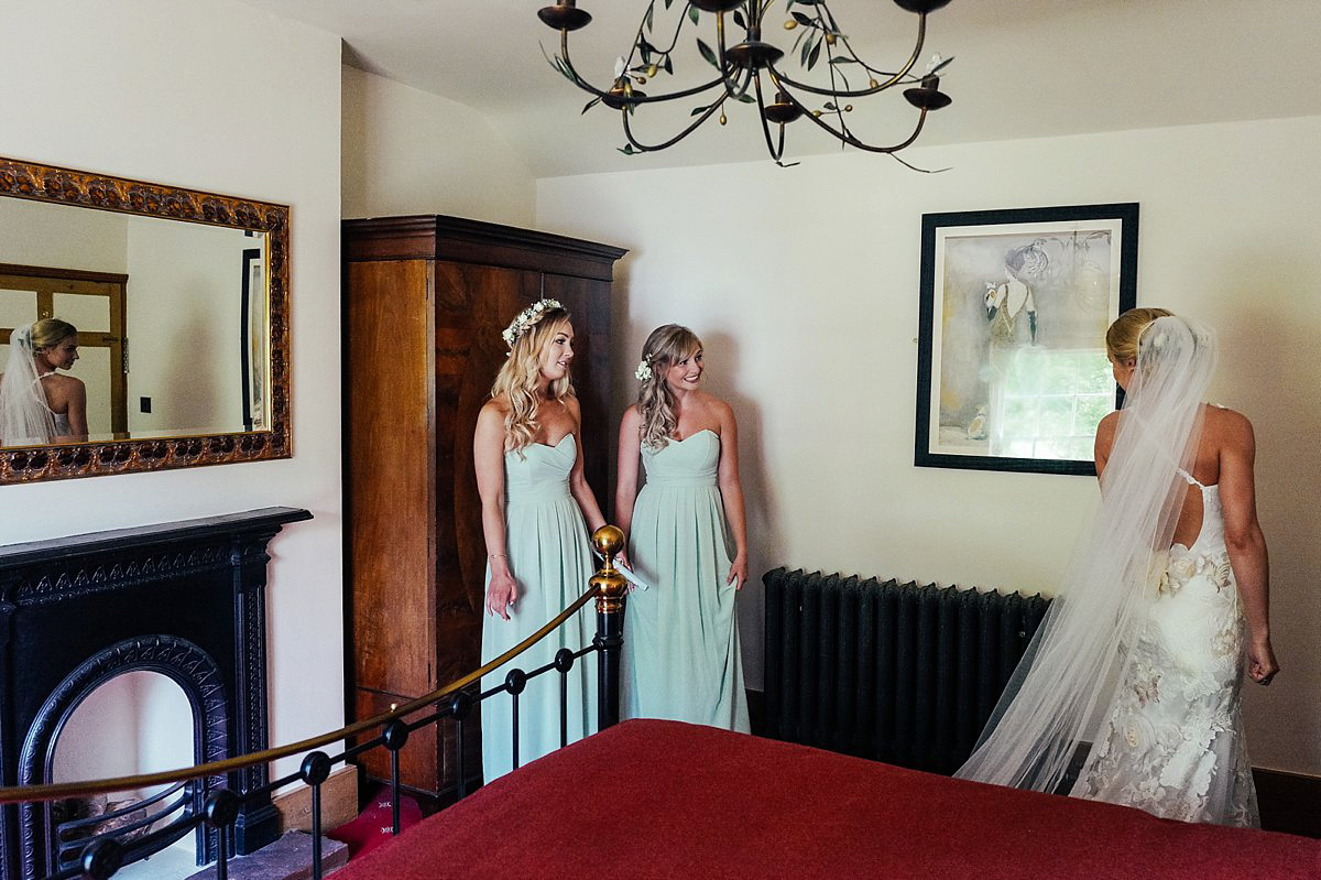 Beautiful bride Clare wore the Mariposa gown by Claire Pettibone for her laid back, fun and elegant Lake District Wedding. Photography by Lisa Aldersley.