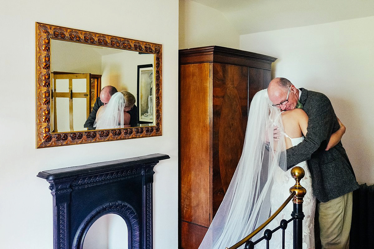 Beautiful bride Clare wore the Mariposa gown by Claire Pettibone for her laid back, fun and elegant Lake District Wedding. Photography by Lisa Aldersley.