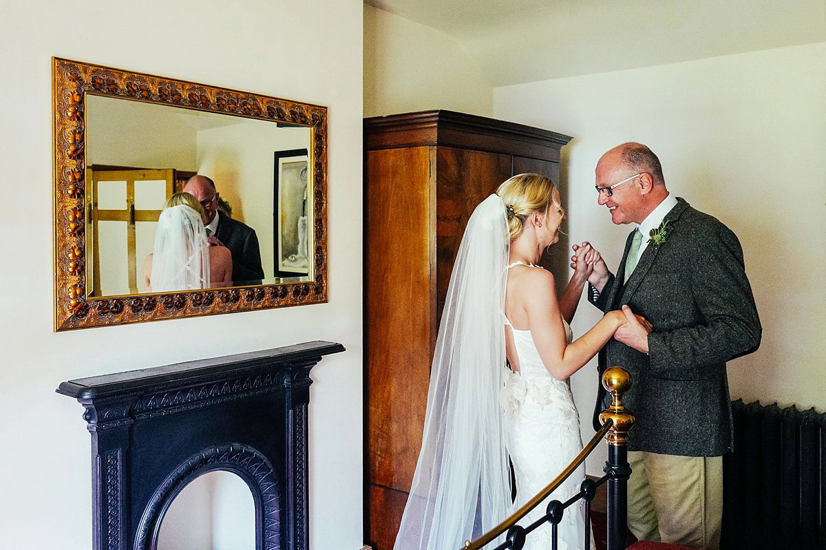 Beautiful bride Clare wore the Mariposa gown by Claire Pettibone for her laid back, fun and elegant Lake District Wedding. Photography by Lisa Aldersley.