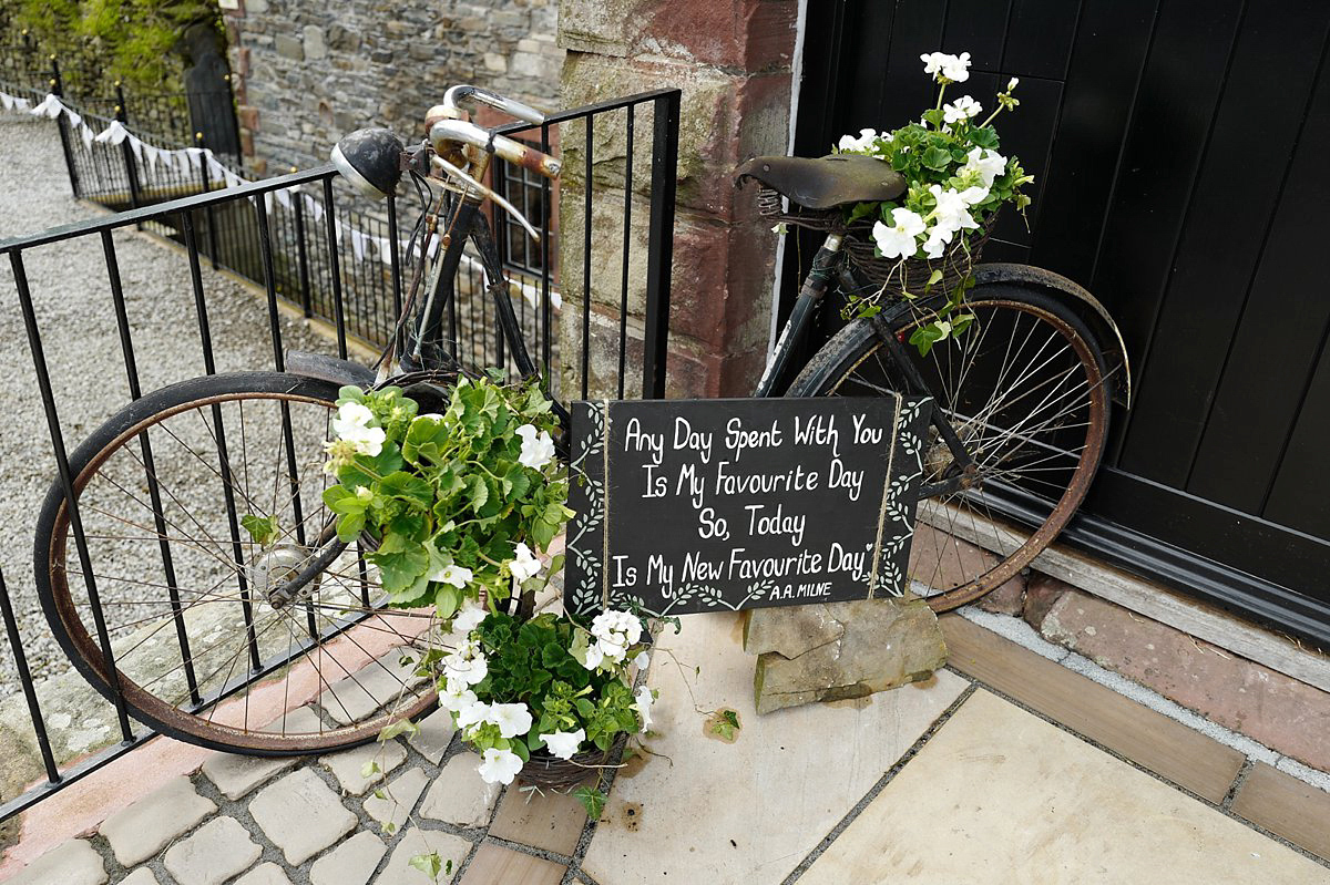 Beautiful bride Clare wore the Mariposa gown by Claire Pettibone for her laid back, fun and elegant Lake District Wedding. Photography by Lisa Aldersley.