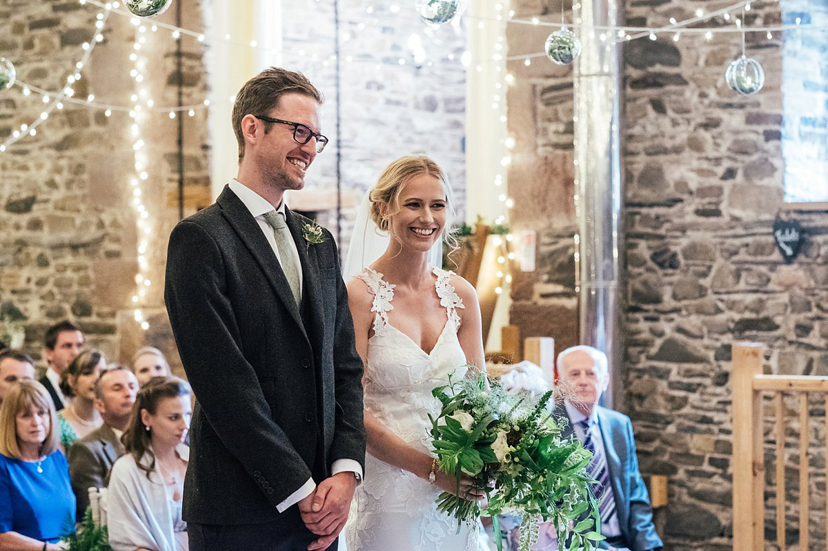 Beautiful bride Clare wore the Mariposa gown by Claire Pettibone for her laid back, fun and elegant Lake District Wedding. Photography by Lisa Aldersley.