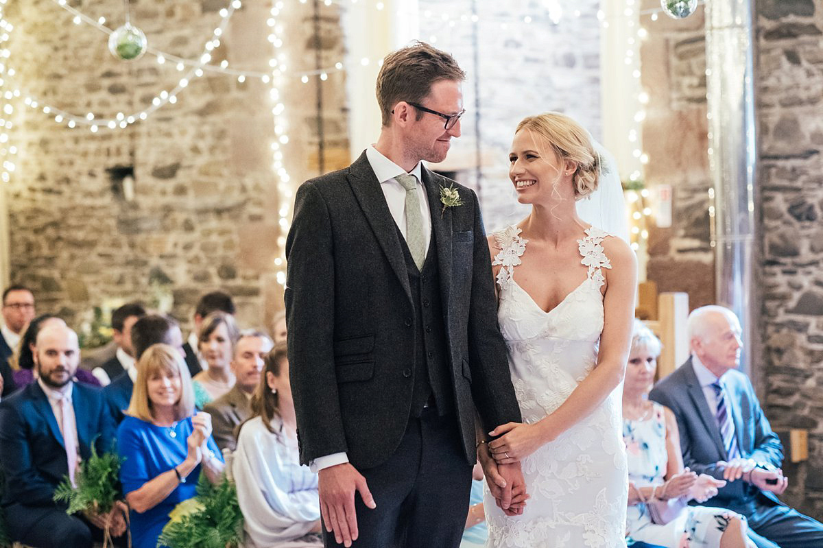 Beautiful bride Clare wore the Mariposa gown by Claire Pettibone for her laid back, fun and elegant Lake District Wedding. Photography by Lisa Aldersley.