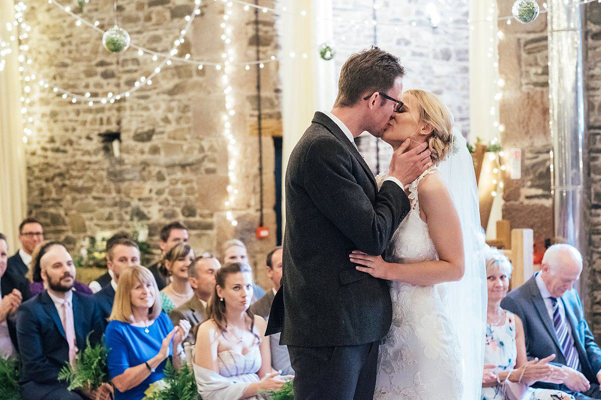 Beautiful bride Clare wore the Mariposa gown by Claire Pettibone for her laid back, fun and elegant Lake District Wedding. Photography by Lisa Aldersley.