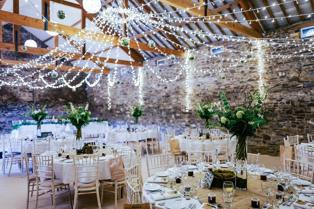 Beautiful bride Clare wore the Mariposa gown by Claire Pettibone for her laid back, fun and elegant Lake District Wedding. Photography by Lisa Aldersley.