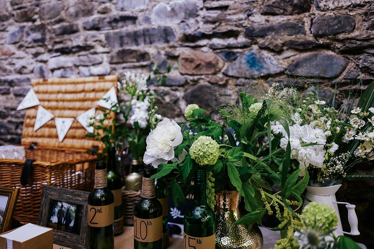 Beautiful bride Clare wore the Mariposa gown by Claire Pettibone for her laid back, fun and elegant Lake District Wedding. Photography by Lisa Aldersley.