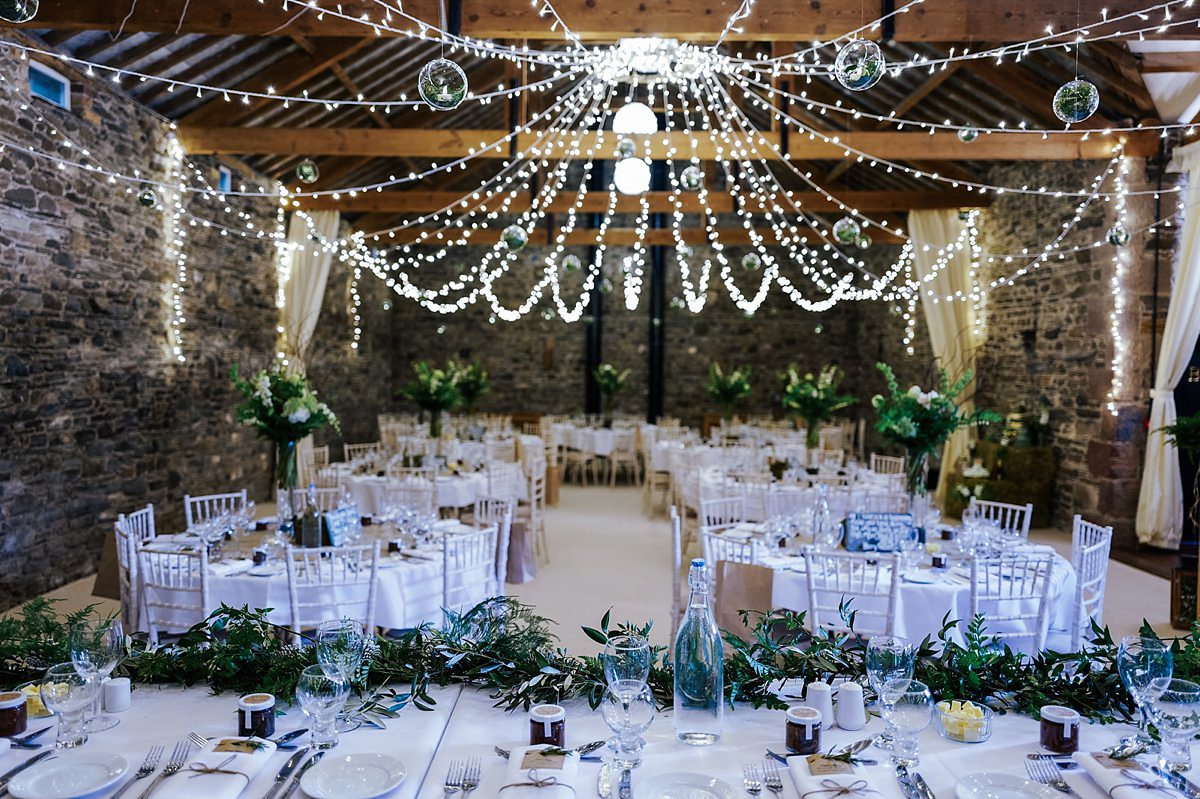 Beautiful bride Clare wore the Mariposa gown by Claire Pettibone for her laid back, fun and elegant Lake District Wedding. Photography by Lisa Aldersley.