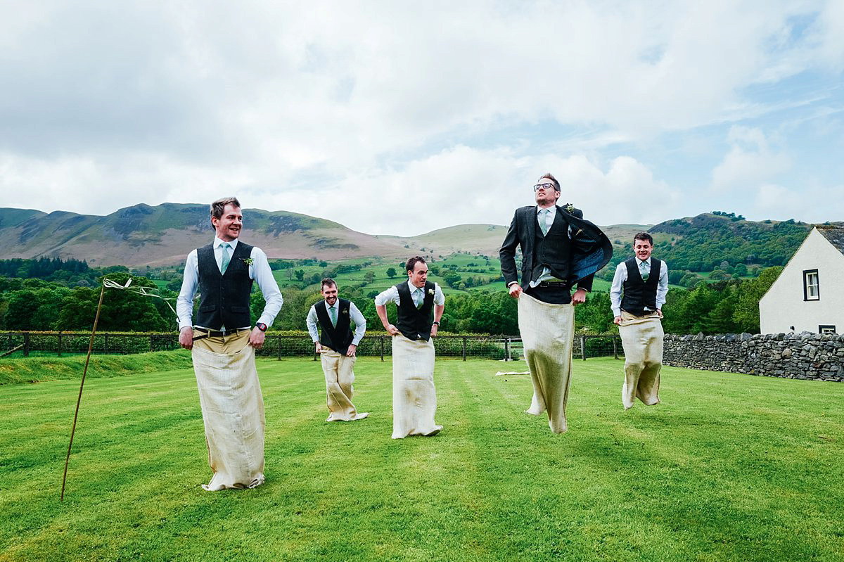 Beautiful bride Clare wore the Mariposa gown by Claire Pettibone for her laid back, fun and elegant Lake District Wedding. Photography by Lisa Aldersley.