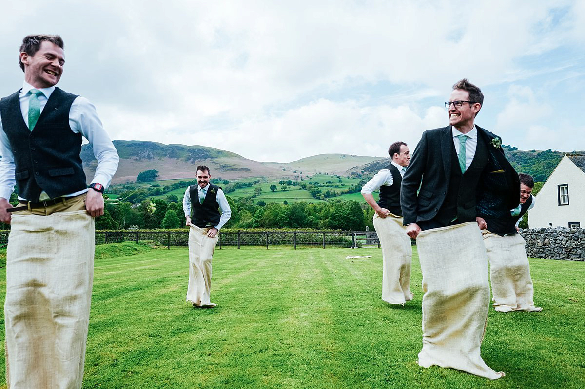 Beautiful bride Clare wore the Mariposa gown by Claire Pettibone for her laid back, fun and elegant Lake District Wedding. Photography by Lisa Aldersley.