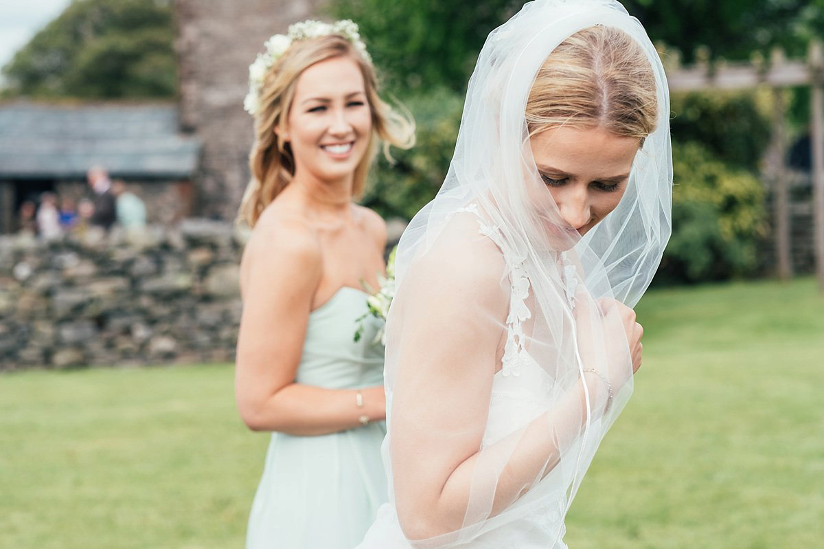 Beautiful bride Clare wore the Mariposa gown by Claire Pettibone for her laid back, fun and elegant Lake District Wedding. Photography by Lisa Aldersley.