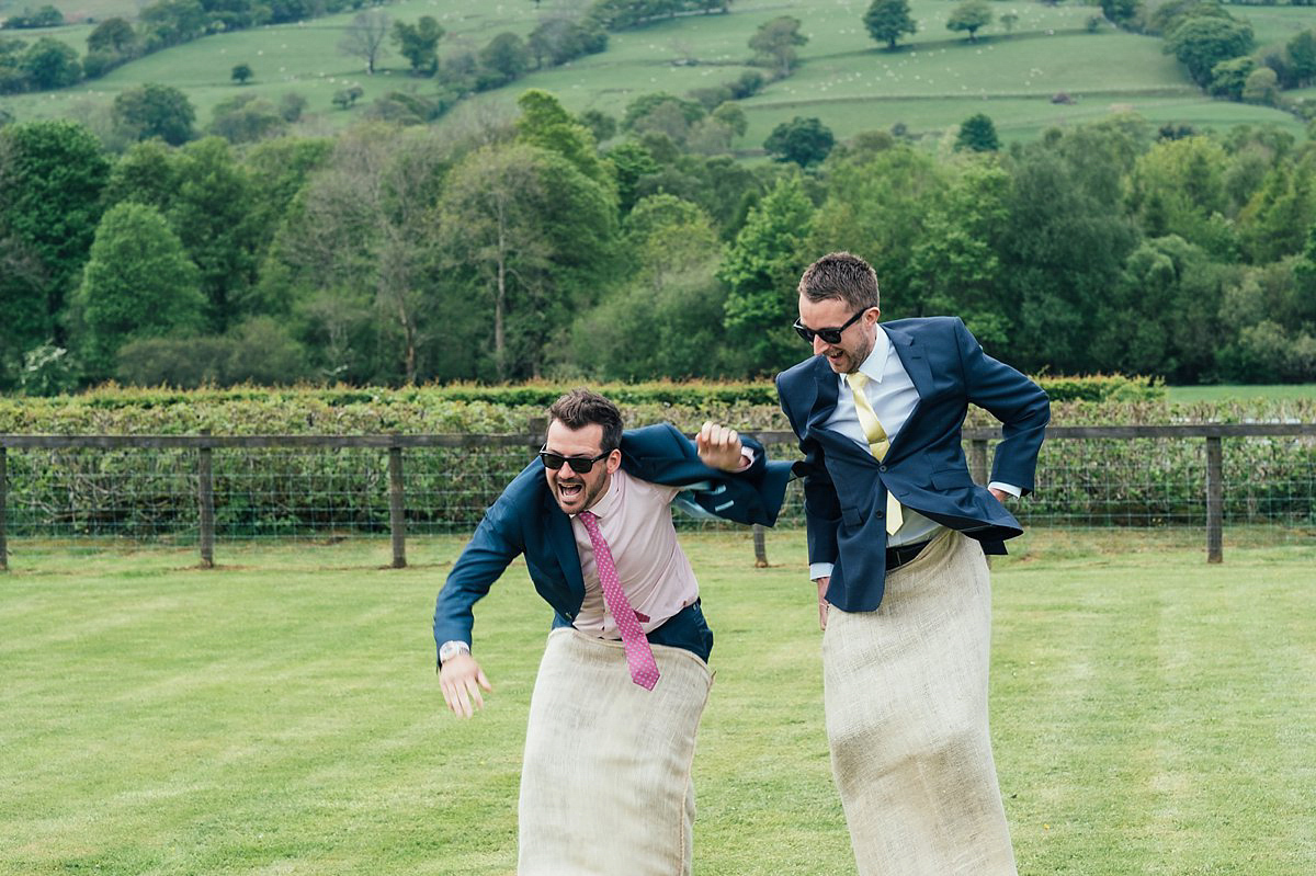 Beautiful bride Clare wore the Mariposa gown by Claire Pettibone for her laid back, fun and elegant Lake District Wedding. Photography by Lisa Aldersley.