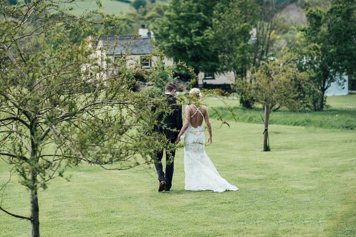 Beautiful bride Clare wore the Mariposa gown by Claire Pettibone for her laid back, fun and elegant Lake District Wedding. Photography by Lisa Aldersley.