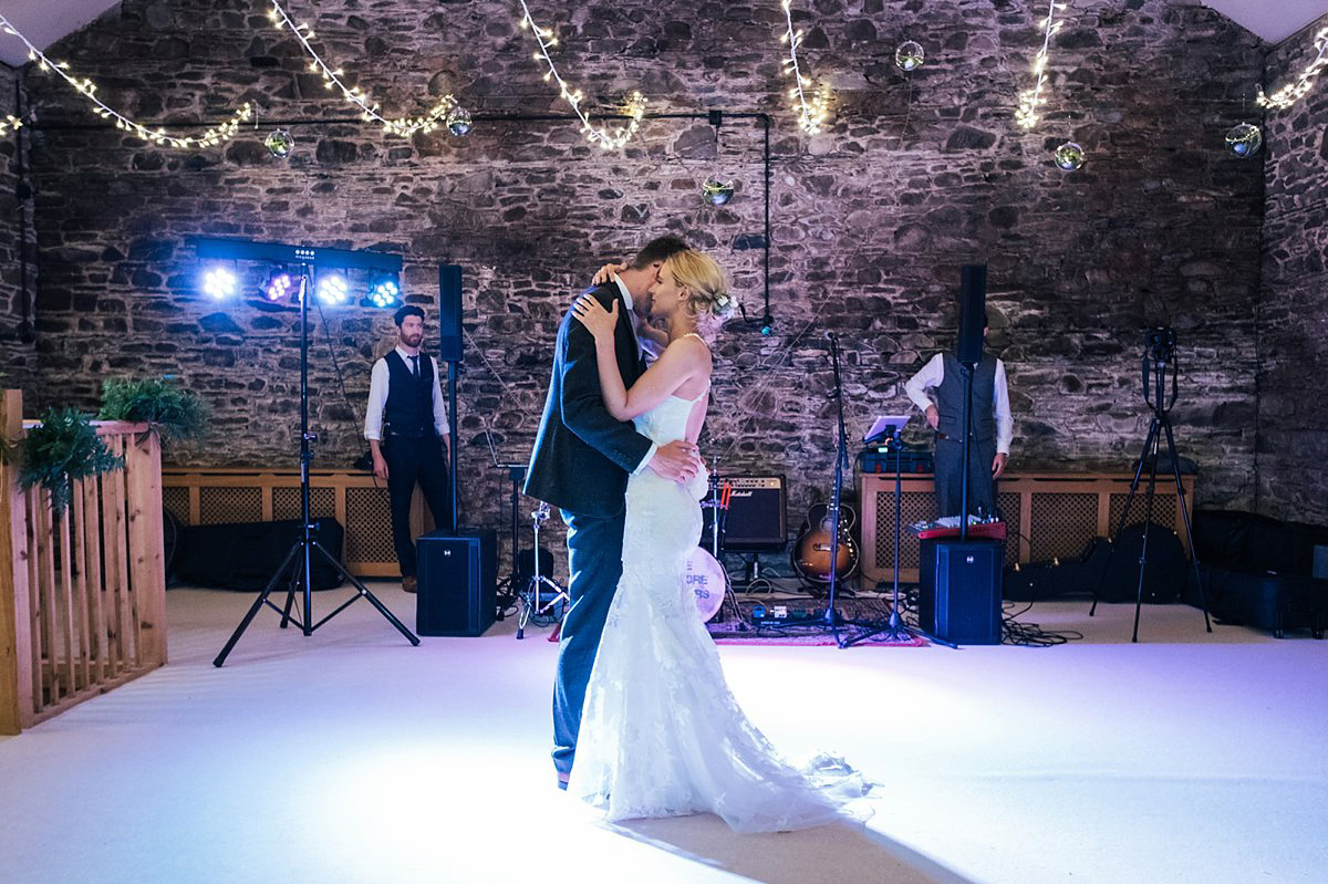 Beautiful bride Clare wore the Mariposa gown by Claire Pettibone for her laid back, fun and elegant Lake District Wedding. Photography by Lisa Aldersley.