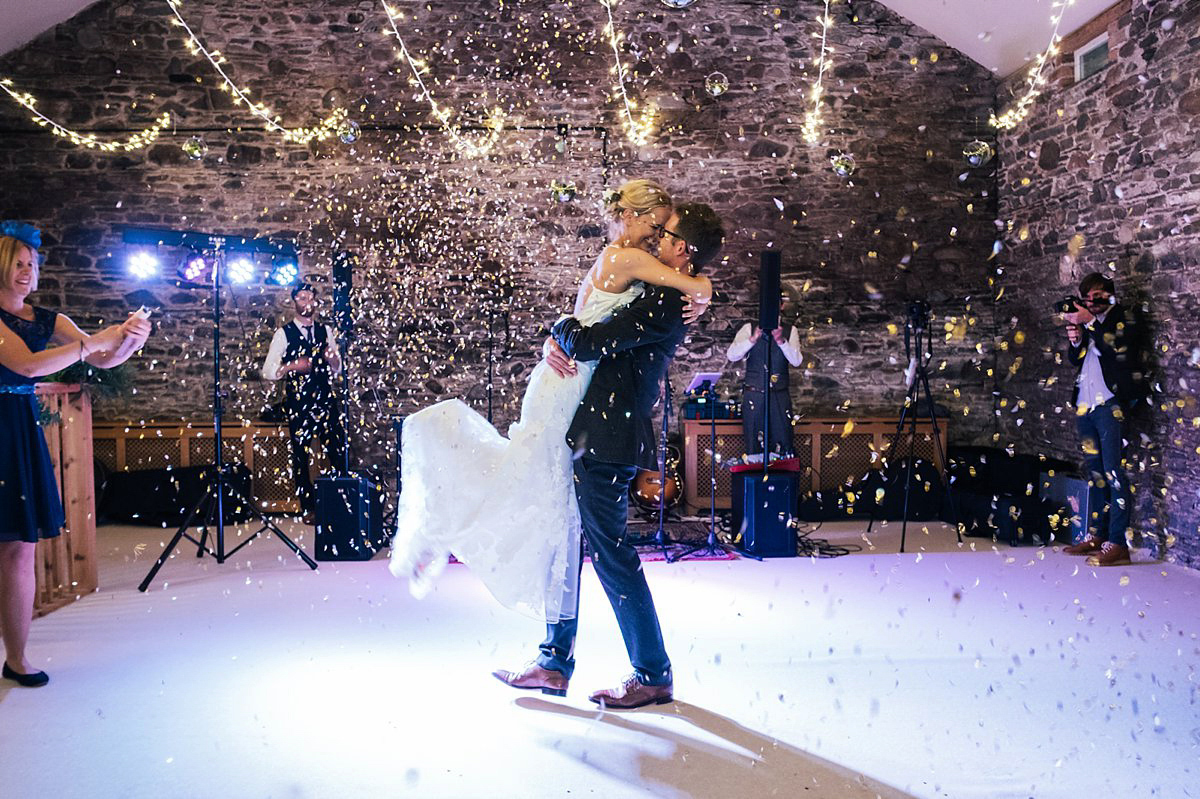 Beautiful bride Clare wore the Mariposa gown by Claire Pettibone for her laid back, fun and elegant Lake District Wedding. Photography by Lisa Aldersley.