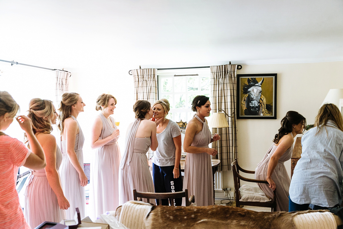 Bride Sophie wore an Amanda Wakeley gown for her fuss-free, stylish, military wedding in the Suffolk countryside. Photography by Nick Tucker.