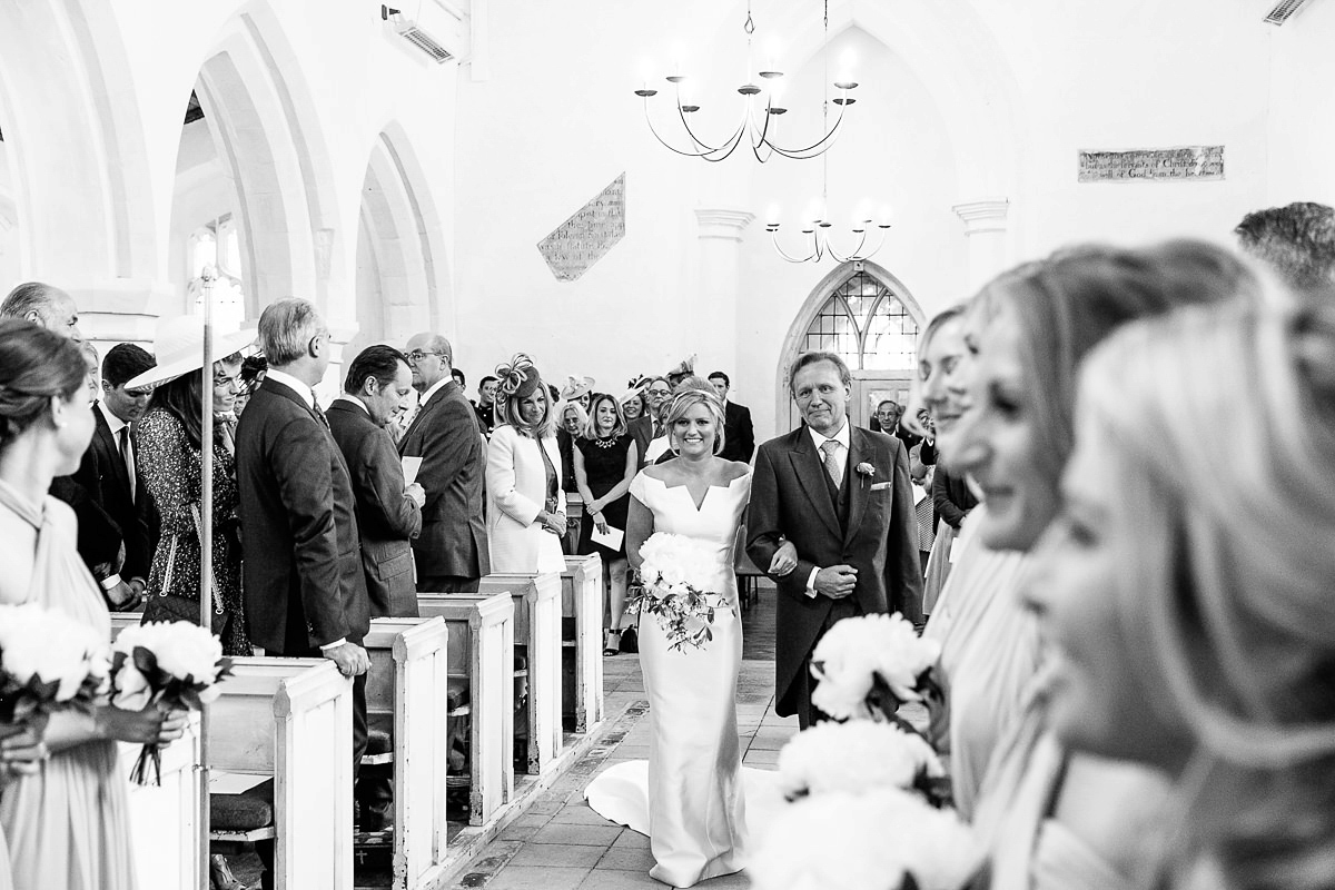 Bride Sophie wore an Amanda Wakeley gown for her fuss-free, stylish, military wedding in the Suffolk countryside. Photography by Nick Tucker.