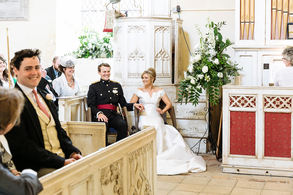 Bride Sophie wore an Amanda Wakeley gown for her fuss-free, stylish, military wedding in the Suffolk countryside. Photography by Nick Tucker.