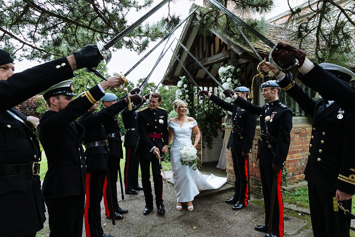 Bride Sophie wore an Amanda Wakeley gown for her fuss-free, stylish, military wedding in the Suffolk countryside. Photography by Nick Tucker.