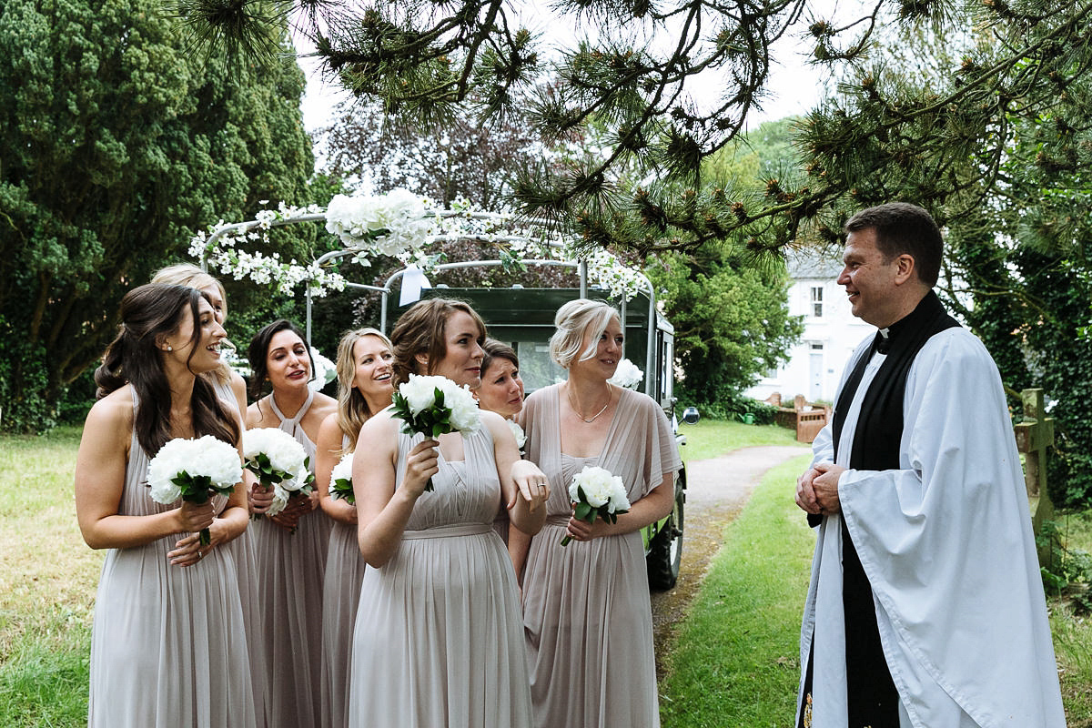 Bride Sophie wore an Amanda Wakeley gown for her fuss-free, stylish, military wedding in the Suffolk countryside. Photography by Nick Tucker.