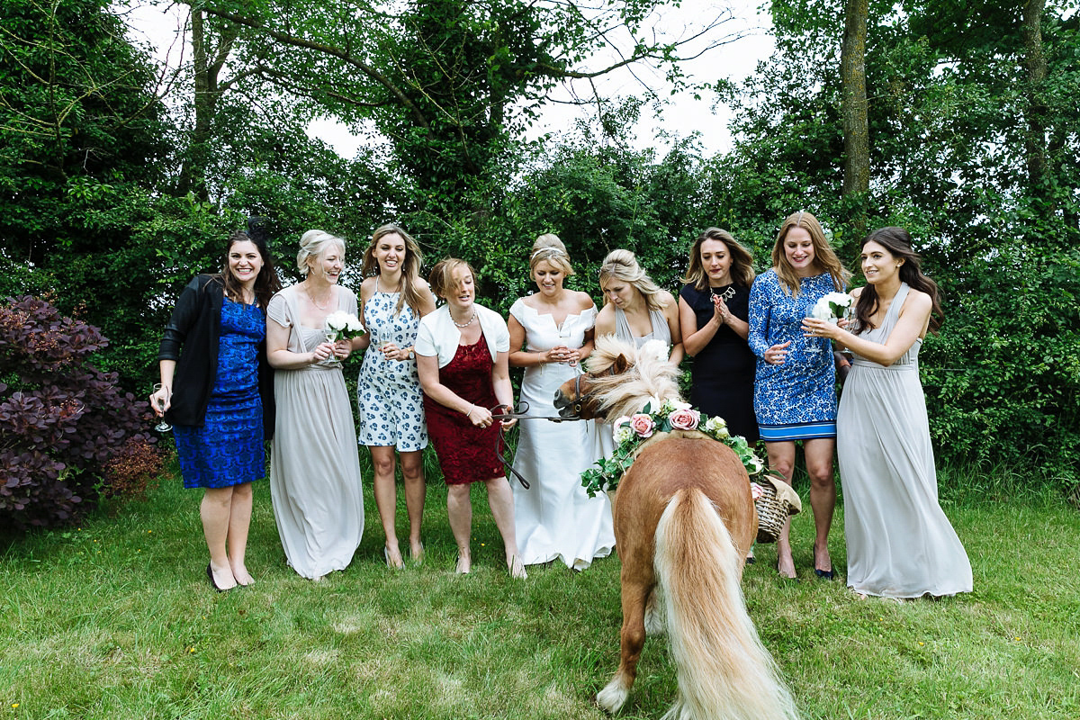Bride Sophie wore an Amanda Wakeley gown for her fuss-free, stylish, military wedding in the Suffolk countryside. Photography by Nick Tucker.