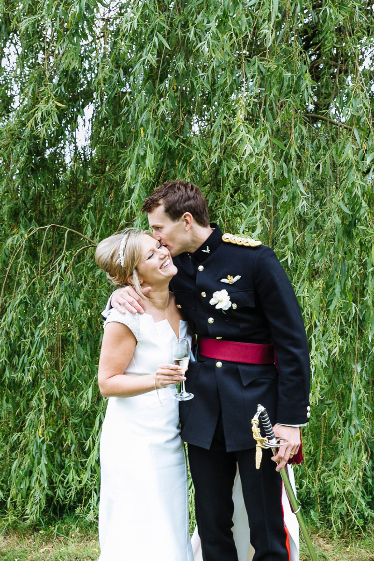 Bride Sophie wore an Amanda Wakeley gown for her fuss-free, stylish, military wedding in the Suffolk countryside. Photography by Nick Tucker.