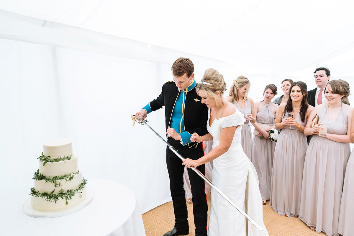 Bride Sophie wore an Amanda Wakeley gown for her fuss-free, stylish, military wedding in the Suffolk countryside. Photography by Nick Tucker.