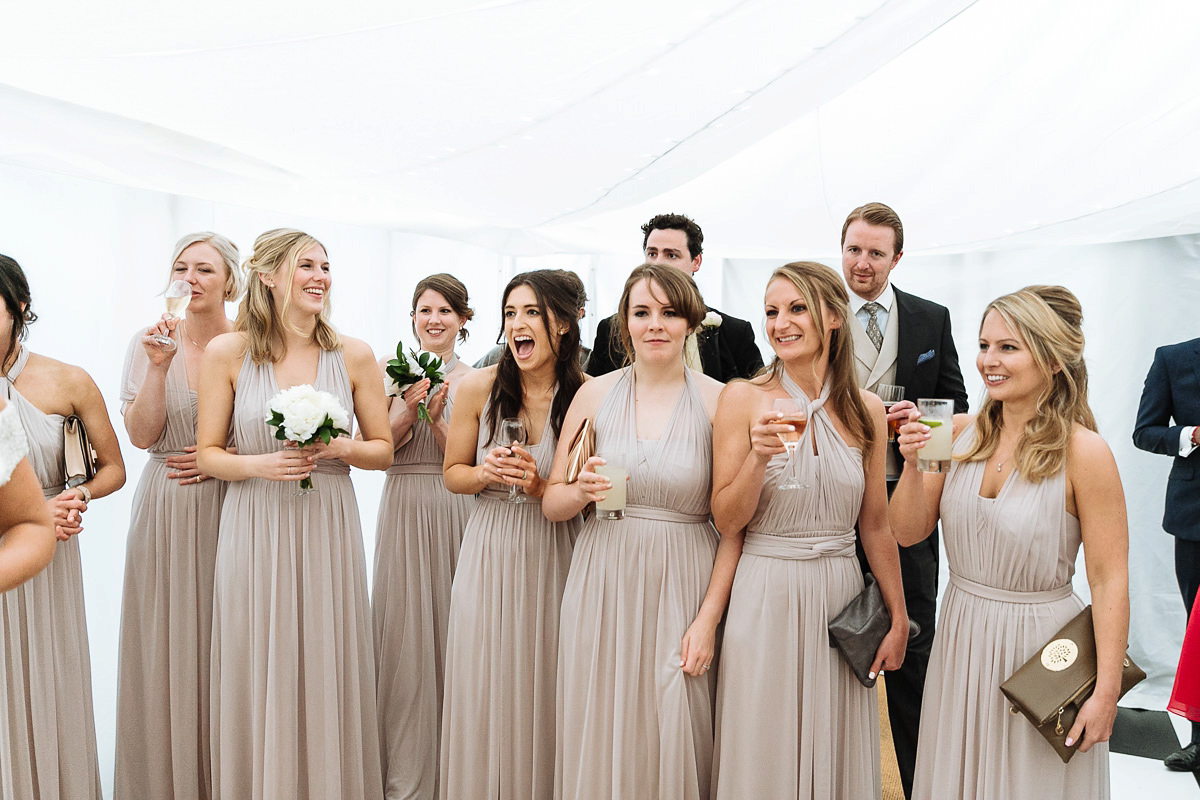 Bride Sophie wore an Amanda Wakeley gown for her fuss-free, stylish, military wedding in the Suffolk countryside. Photography by Nick Tucker.