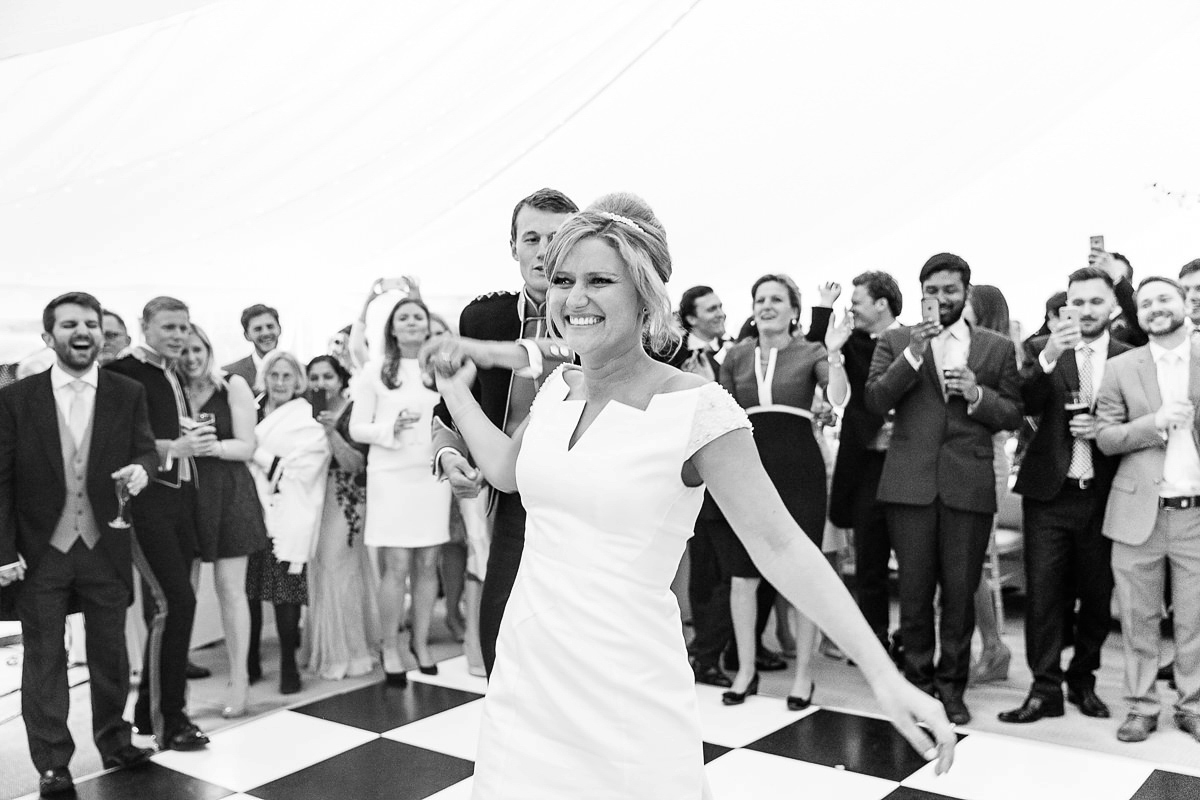 Bride Sophie wore an Amanda Wakeley gown for her fuss-free, stylish, military wedding in the Suffolk countryside. Photography by Nick Tucker.