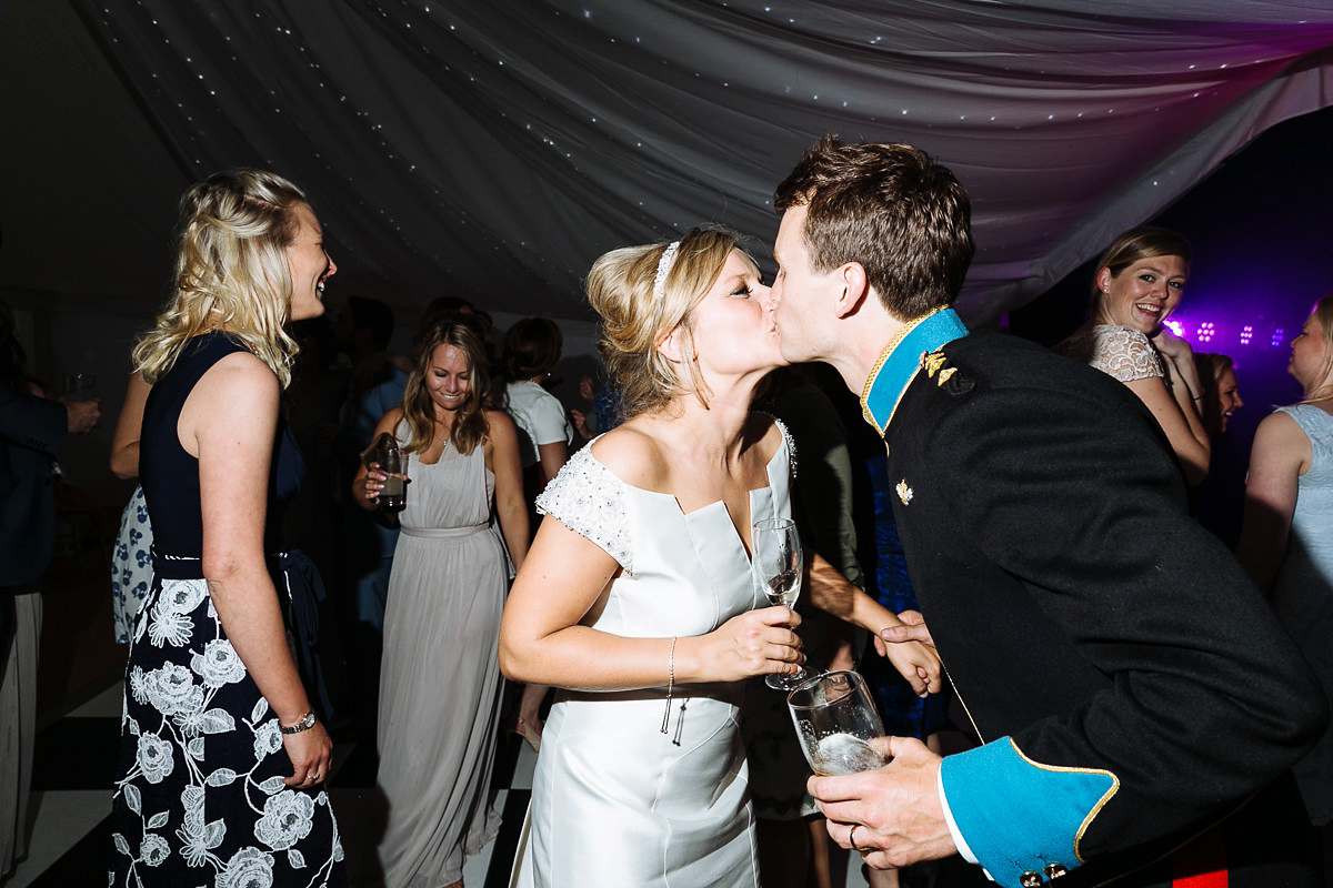 Bride Sophie wore an Amanda Wakeley gown for her fuss-free, stylish, military wedding in the Suffolk countryside. Photography by Nick Tucker.