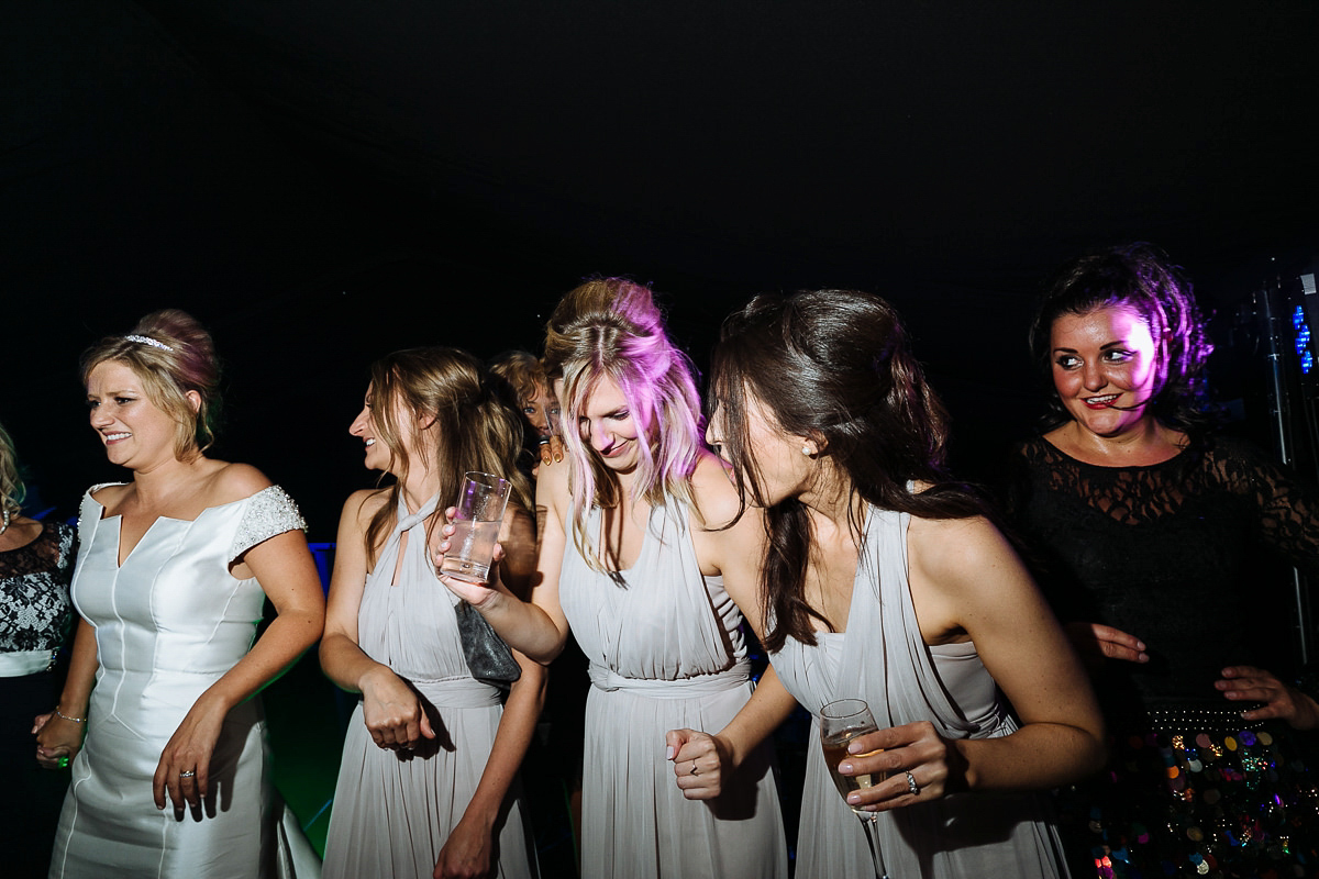 Bride Sophie wore an Amanda Wakeley gown for her fuss-free, stylish, military wedding in the Suffolk countryside. Photography by Nick Tucker.