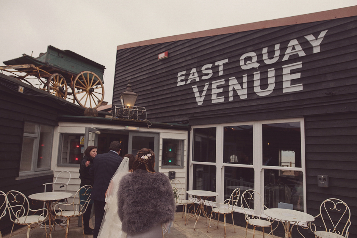 Florist Joanne of Joanne Truby Floral Design wore Stewart Parvin to marry her beau Steve by the sea in Whitstable. Photography by Rebecca Douglas.