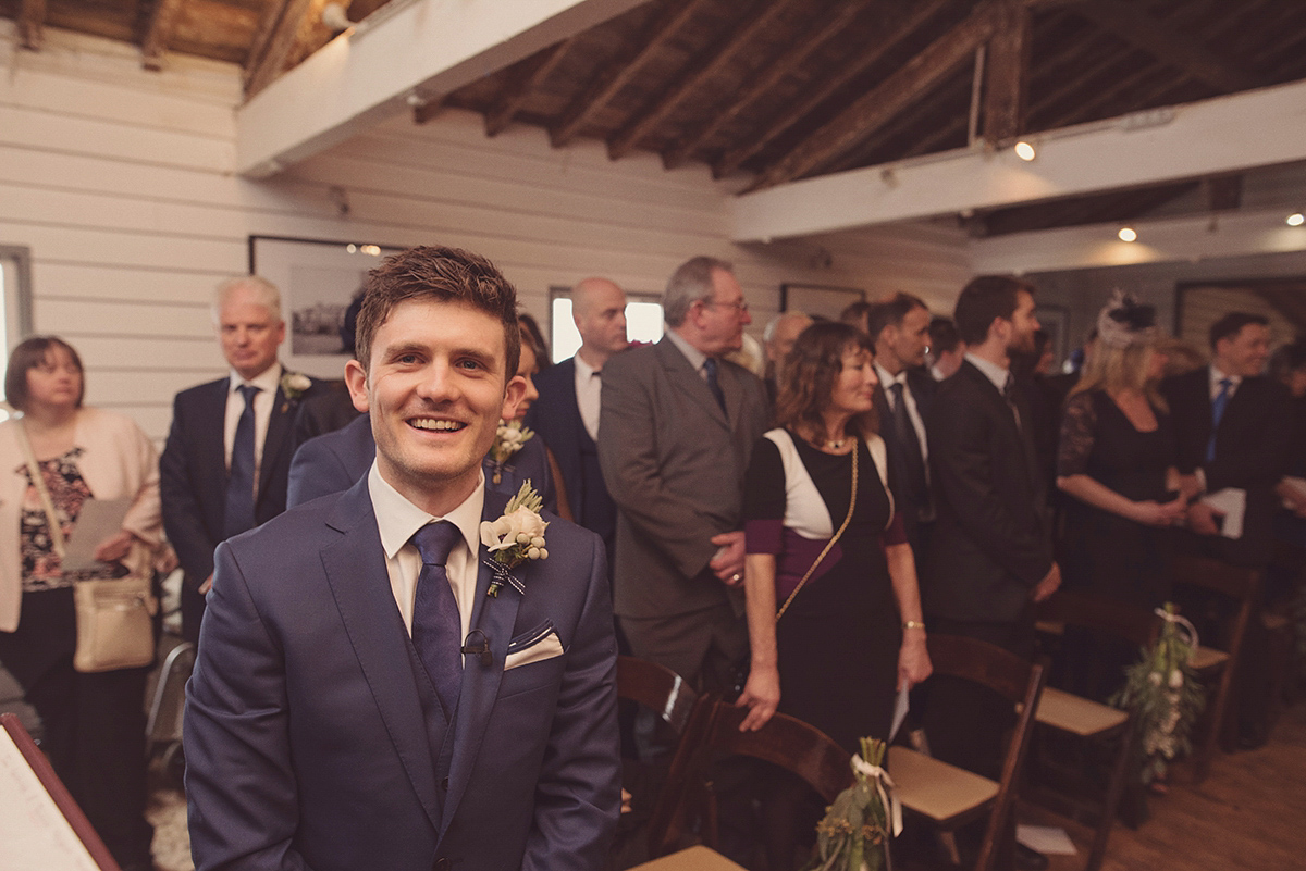 Florist Joanne of Joanne Truby Floral Design wore Stewart Parvin to marry her beau Steve by the sea in Whitstable. Photography by Rebecca Douglas.