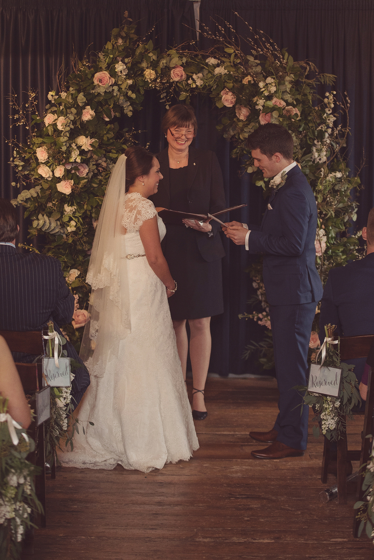 Florist Joanne of Joanne Truby Floral Design wore Stewart Parvin to marry her beau Steve by the sea in Whitstable. Photography by Rebecca Douglas.