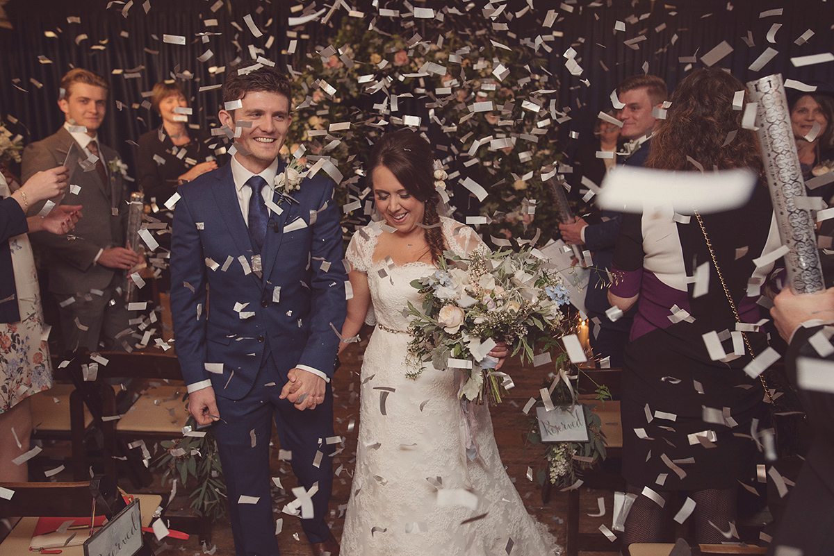 Florist Joanne of Joanne Truby Floral Design wore Stewart Parvin to marry her beau Steve by the sea in Whitstable. Photography by Rebecca Douglas.