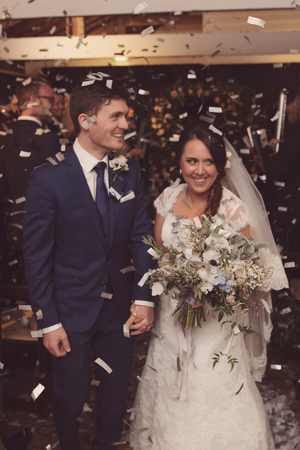 Florist Joanne of Joanne Truby Floral Design wore Stewart Parvin to marry her beau Steve by the sea in Whitstable. Photography by Rebecca Douglas.