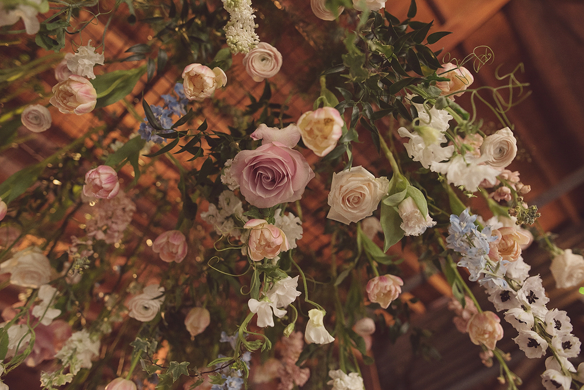 Florist Joanne of Joanne Truby Floral Design wore Stewart Parvin to marry her beau Steve by the sea in Whitstable. Photography by Rebecca Douglas.