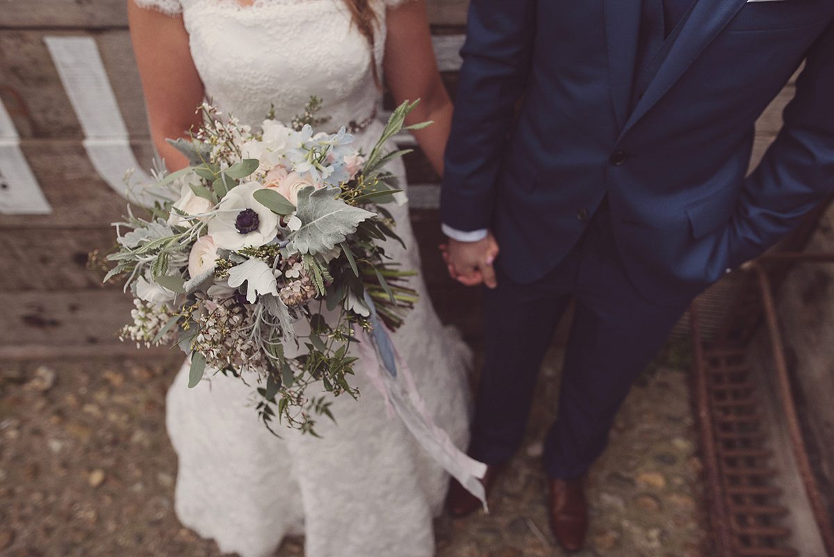 Florist Joanne of Joanne Truby Floral Design wore Stewart Parvin to marry her beau Steve by the sea in Whitstable. Photography by Rebecca Douglas.