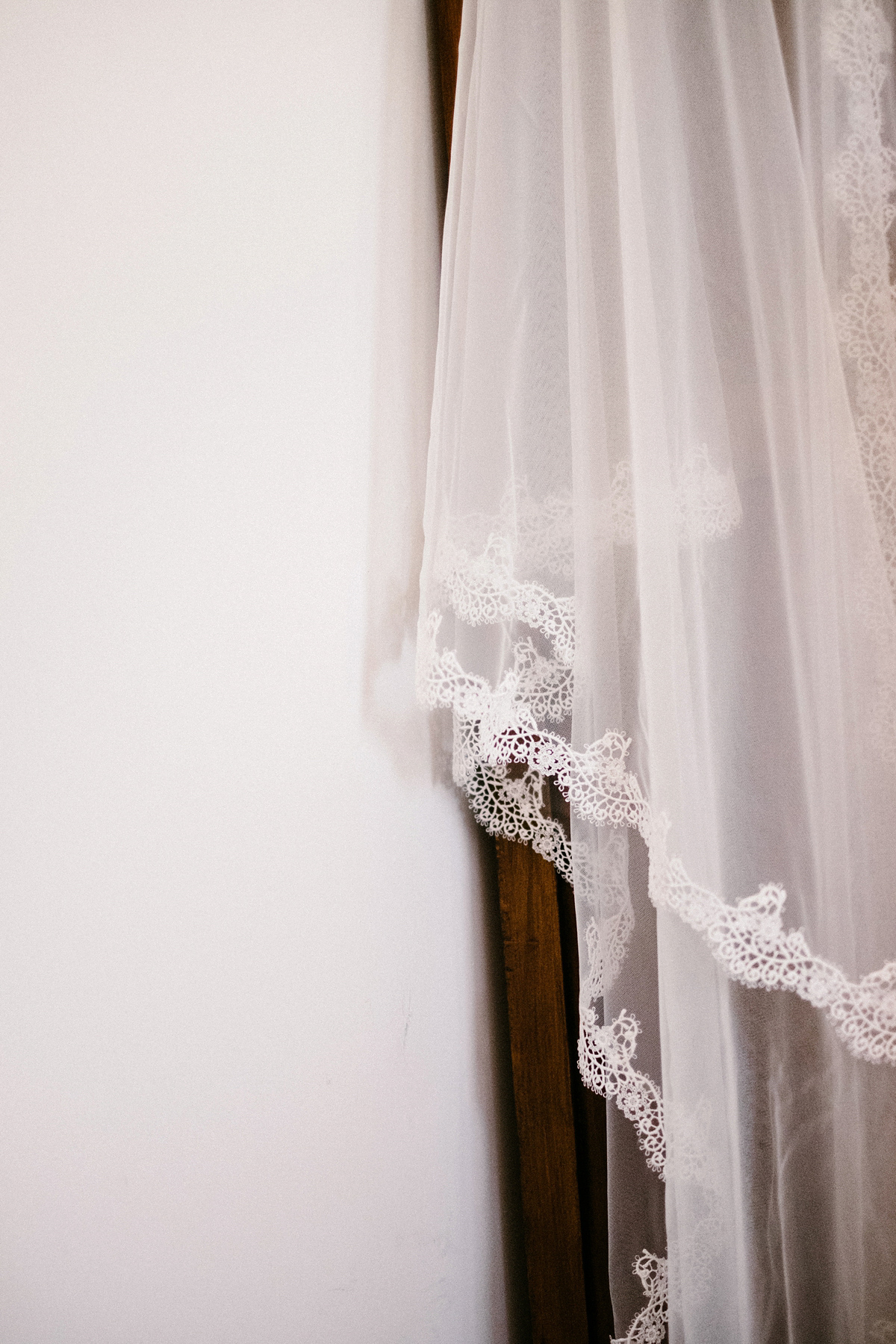 Bride Laura wears a bespoke wedding dress by Wilden Bride for her elegant destination wedding in Spain. Photography by Claudia Rose Carter.