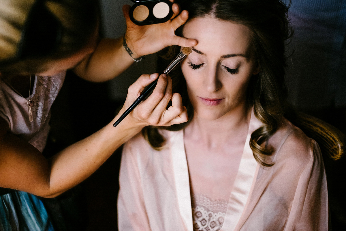 Bride Laura wears a bespoke wedding dress by Wilden Bride for her elegant destination wedding in Spain. Photography by Claudia Rose Carter.