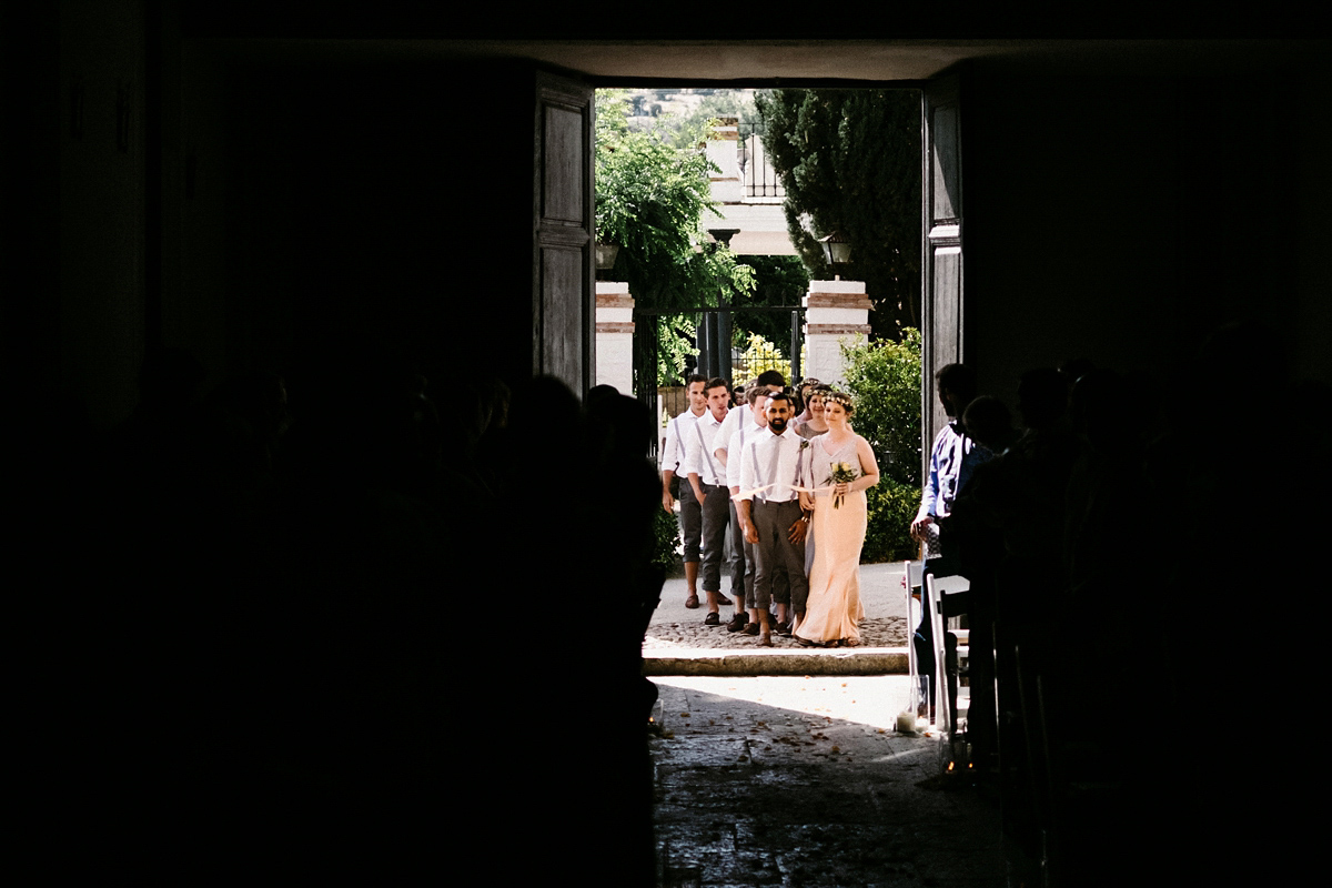 Bride Laura wears a bespoke wedding dress by Wilden Bride for her elegant destination wedding in Spain. Photography by Claudia Rose Carter.