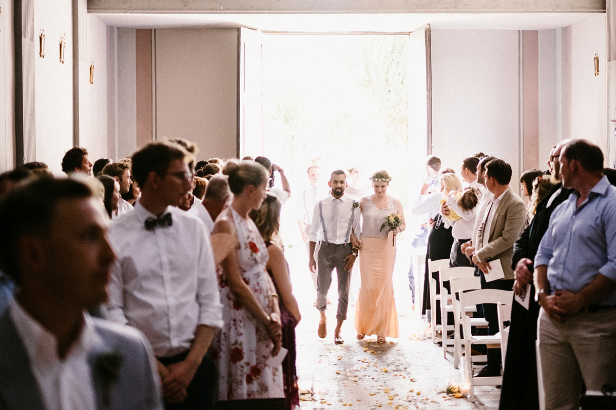 Bride Laura wears a bespoke wedding dress by Wilden Bride for her elegant destination wedding in Spain. Photography by Claudia Rose Carter.