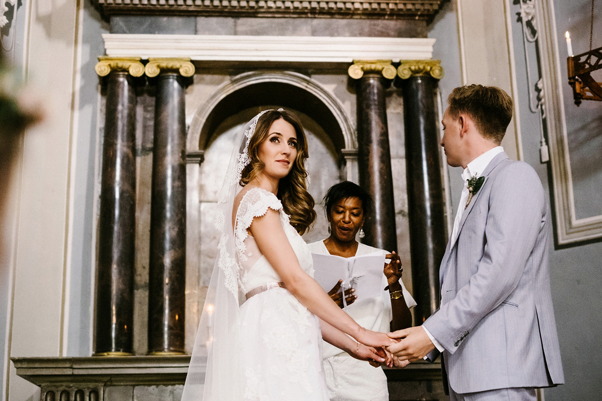 Bride Laura wears a bespoke wedding dress by Wilden Bride for her elegant destination wedding in Spain. Photography by Claudia Rose Carter.