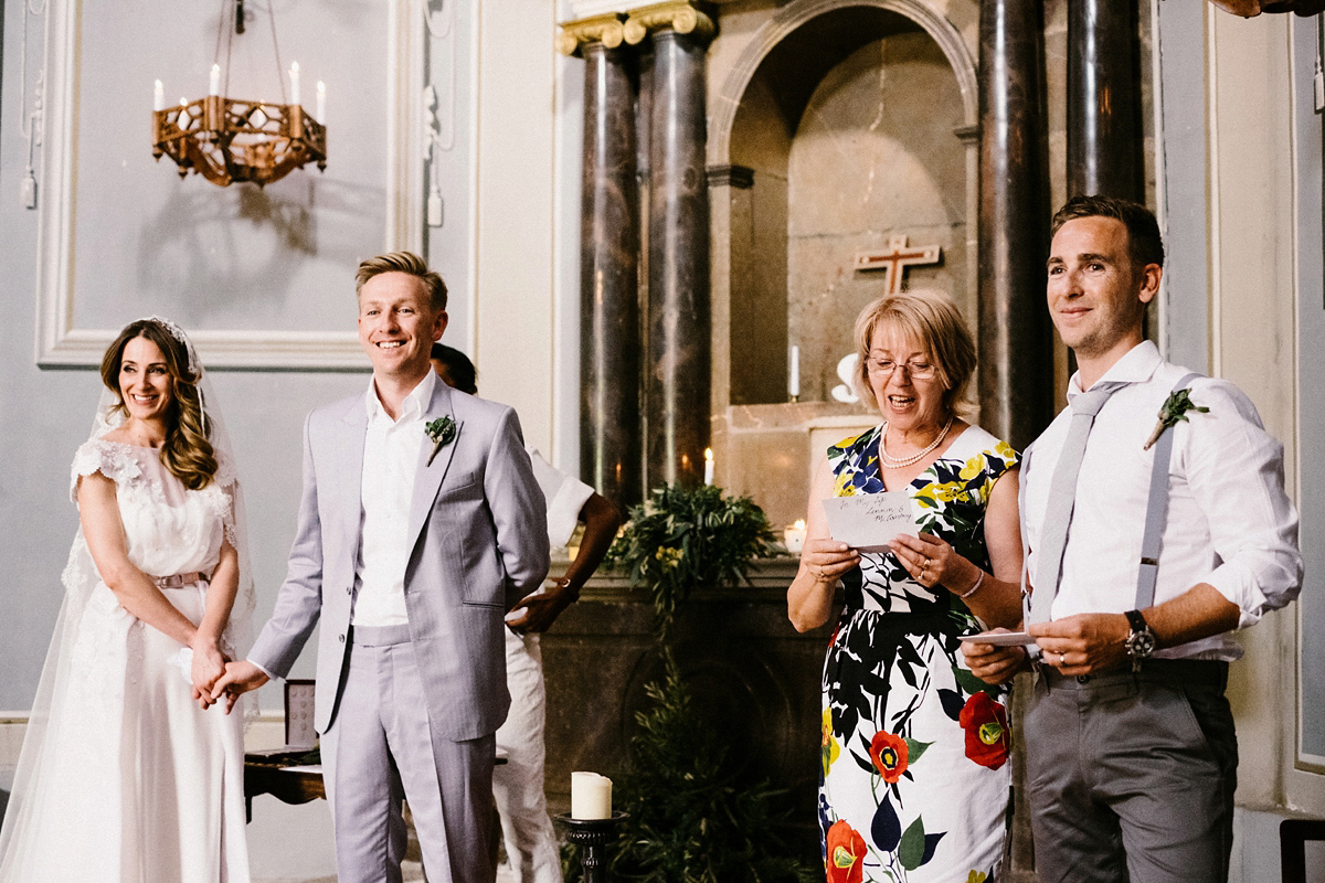 Bride Laura wears a bespoke wedding dress by Wilden Bride for her elegant destination wedding in Spain. Photography by Claudia Rose Carter.