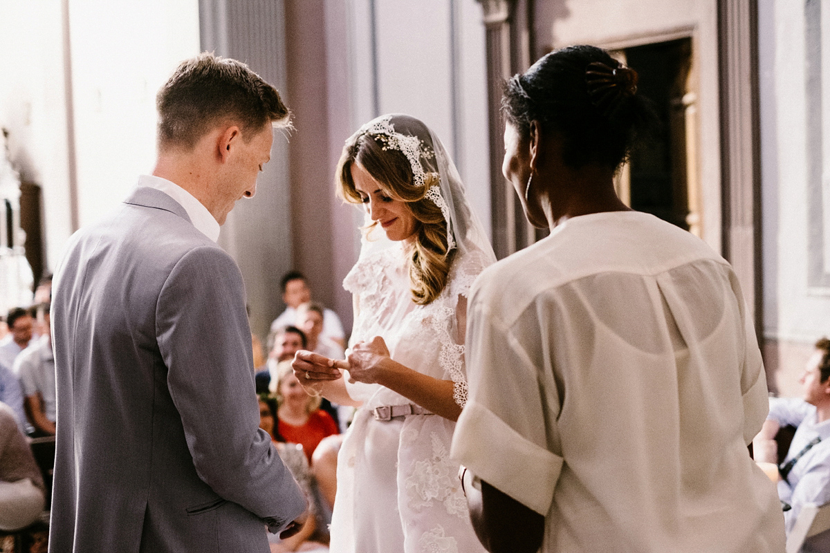 Bride Laura wears a bespoke wedding dress by Wilden Bride for her elegant destination wedding in Spain. Photography by Claudia Rose Carter.