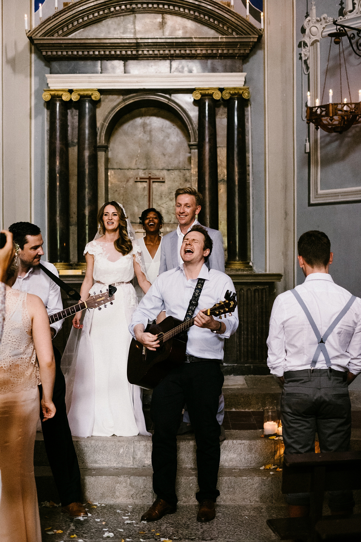 Bride Laura wears a bespoke wedding dress by Wilden Bride for her elegant destination wedding in Spain. Photography by Claudia Rose Carter.