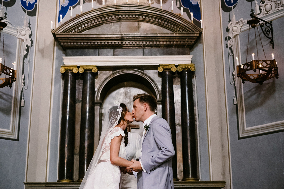 Bride Laura wears a bespoke wedding dress by Wilden Bride for her elegant destination wedding in Spain. Photography by Claudia Rose Carter.