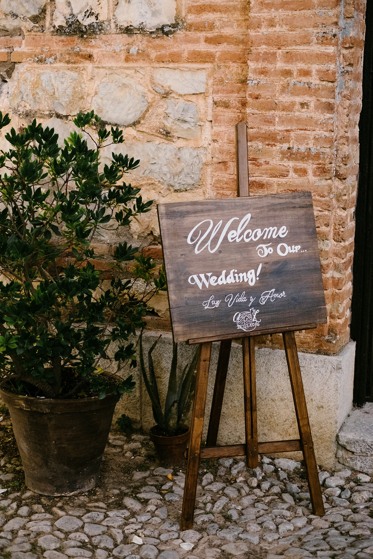 Bride Laura wears a bespoke wedding dress by Wilden Bride for her elegant destination wedding in Spain. Photography by Claudia Rose Carter.