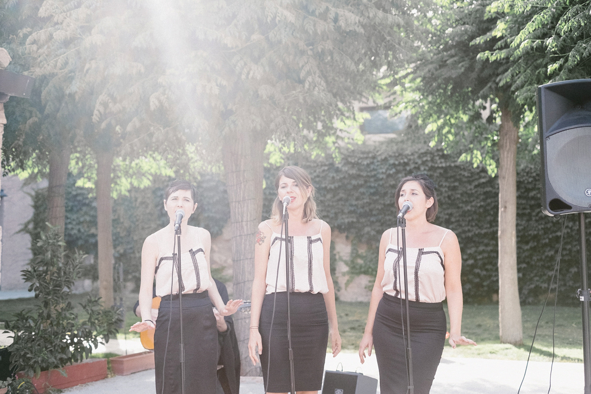 Bride Laura wears a bespoke wedding dress by Wilden Bride for her elegant destination wedding in Spain. Photography by Claudia Rose Carter.